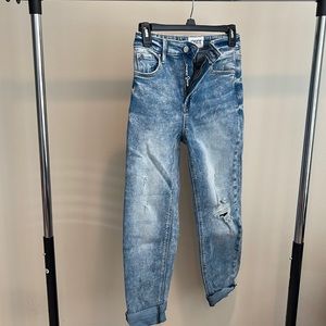 High waisted distressed jeans